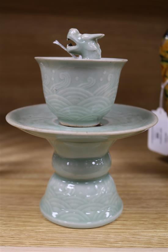 A 19th century Chinese celadon cup and stand